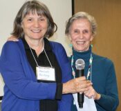 [Outgoing LWVNM President Judy Williams welcomes new Presiden Hannah Burling]